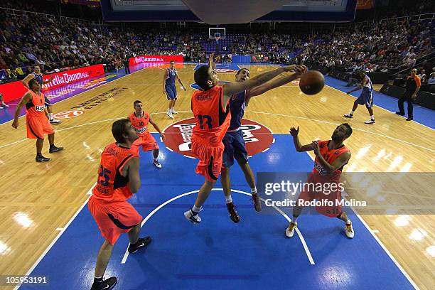 Marin Rozic, #20 of Cibona Zagreb competes with Kosta Perovic, #13 of Regal FC Barcelona during the Turkish Airlines Euroleague Regular Season 2010...