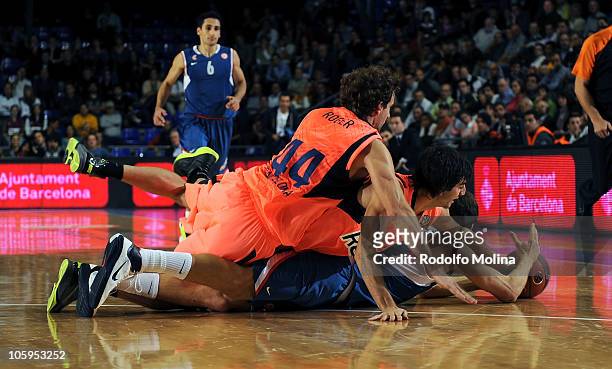Leon Radosevic, #43 of Cibona Zagreb competes with Ricky Rubio, #9 of Regal FC Barcelona and Roger Grimau, #44 during the Turkish Airlines Euroleague...