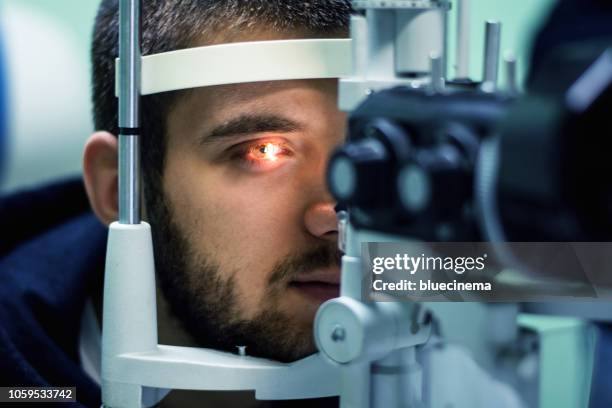 eyesight exam - laser stock pictures, royalty-free photos & images
