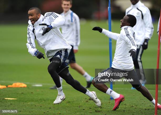 Jose Bosingwa, Gael Kakuta of Chelsea during a training session at the Cobham training ground on October 22, 2010 in Cobham, England.