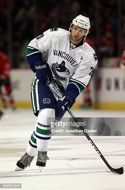 Ryan Parent of the Vancouver Canucks participates in warm-ups before a game against the Chicago Blackhawks at the United Center on October 20, 2010...