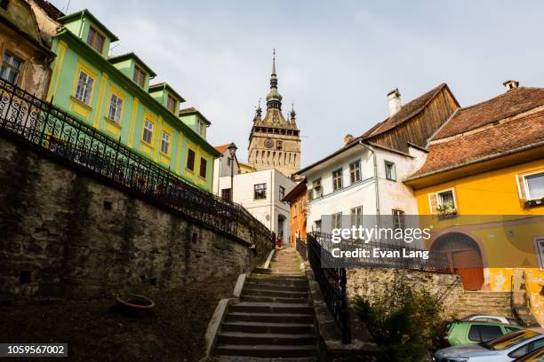 medieval tower, staircase, and colorful european streets - transylvania stock pictures, royalty-free photos & images