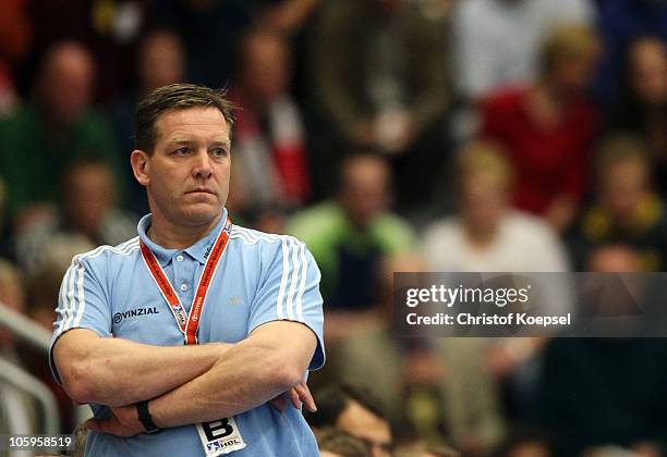 Head coach Alfred Gislason of Kiel looks on during the Toyota Handball Bundesliga match between HSG Ahlen-Hamm and THW Kiel at the Maxipark Arena on...