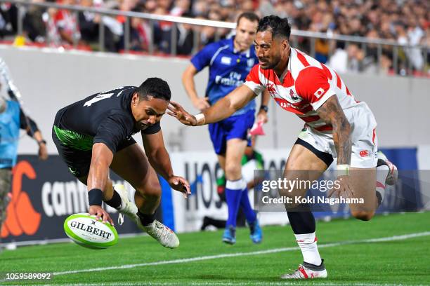 Toni Pulu of the World XV scores his side's second try during the rugby friendly between Japan and World XV at Hanazono Rugby Stadium on October 26,...