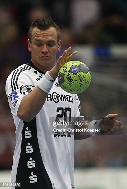 Christian Zeitz of Kiel passes the ball during the Toyota Handball Bundesliga match between HSG Ahlen-Hamm and THW Kiel at the Maxipark Arena on...