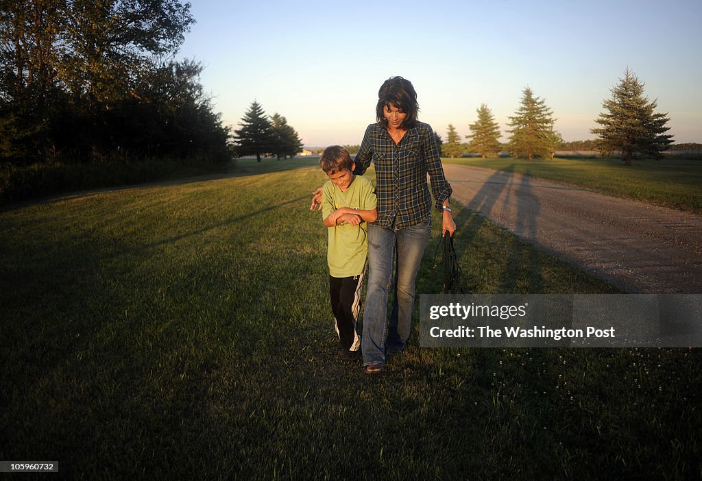 Kristi Noem and her son Booker on the family ranch... Kristi Noem, a Kristi Noem and her son Booker on the family ranch... Kristi Noem, a
