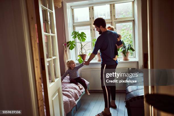 let's go kids! - man with family in home stock pictures, royalty-free photos & images