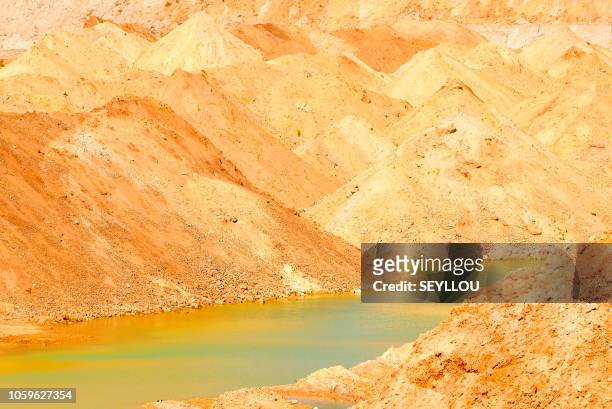 View of the open cast at the Industries Chimiques du Senegal rock phosphate mine in Taiba, some 100 km from the capital of Dakar on November 8 part...