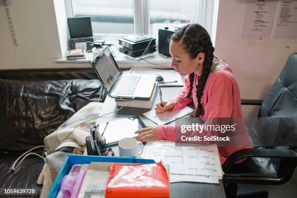 personal trainer planning classes in the office - corporate gym stock pictures, royalty-free photos & images