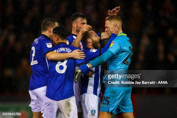 Player of Sheffield Wednesday celebrate with Cameron Dawson of Sheffield Wednesday as he saves a penalty during the Sky Bet Championship match...