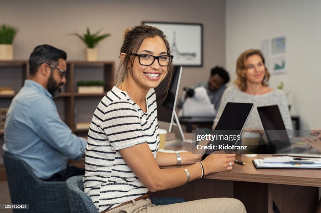 Young casual woman working