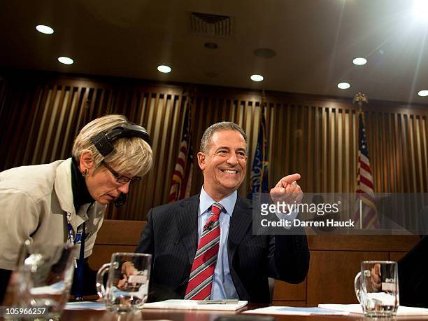 Senator Russ Feingold points before the start of the Wisconsin Senatorial debate against Republican candidate Ron Johnson at Marquette University Law...
