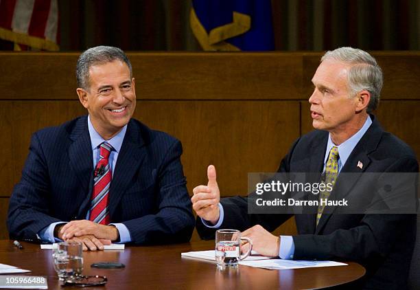 Senator Russ Feingold and Republican candidate Ron Johnson discuss topics as they take part in the Senatorial debate held at Marquette University Law...