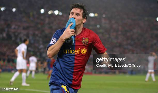 May 2009 Rome UEFA Champions League Final - FC Barcelona v Manchester United - Lionel Messi of Barcelona removes his right boot as he celebrates the...