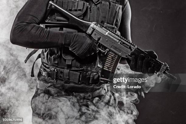 macho male military swat security anti terror member - terror stock pictures, royalty-free photos & images