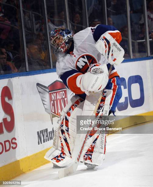Rick DiPietro of the New York Islanders tends net against the New York Rangers at the Nassau Coliseum on October 11, 2010 in Uniondale, New York.