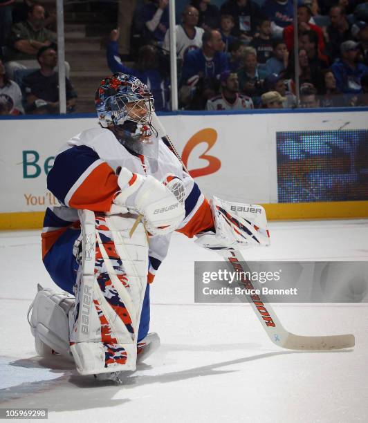 Rick DiPietro of the New York Islanders tends net against the New York Rangers at the Nassau Coliseum on October 11, 2010 in Uniondale, New York.