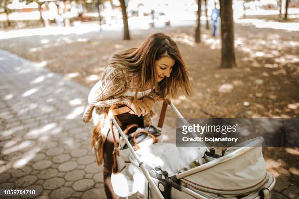 mother and daughter time - carriage stock pictures, royalty-free photos & images