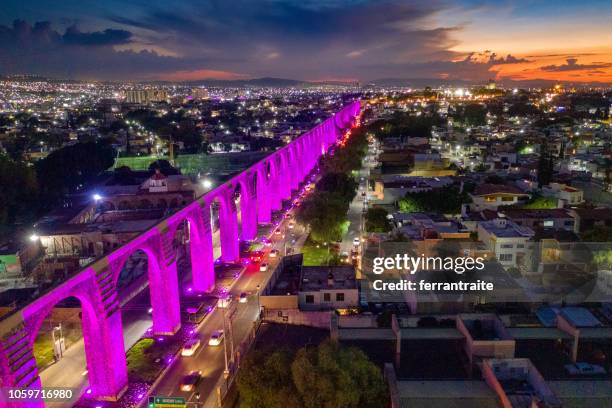 panoramic aerial view of queretaro skyline - aqueduct stock pictures, royalty-free photos & images