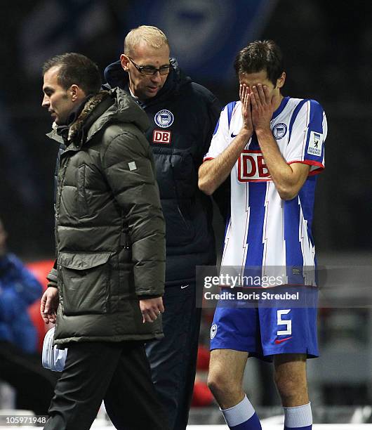 Andre Mijatovic of Berlin leaves the pitch after picking up an injury during the Second Bundesliga match between Hertha BSC Berlin and SpVgg Greuther...