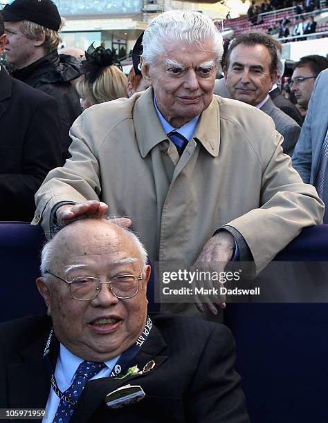 Trainer Bart Cummings gives a pat on the head to owner Dato Tan Chin Nam after their horse So You Think took out the 2010 Tatts Cox Plate during Cox...