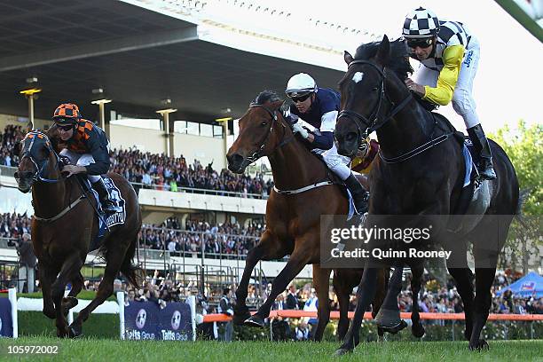 Jockey Steven Arnold riding So You Think wins Race Eight the Tatts Cox Plate during Cox Plate Day at Moonee Valley Racecourse on October 23, 2010 in...