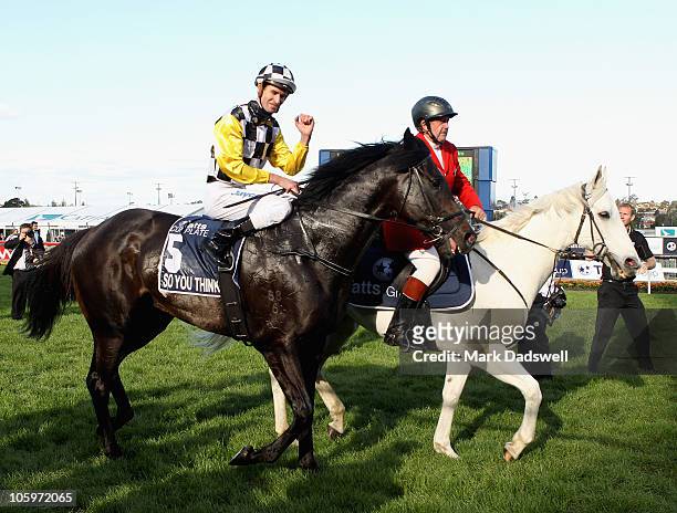 Jockey Steven Arnold riding So You Think celebrates his win in the 2010 Tatts Cox Plate during Cox Plate Day at Moonee Valley Racecourse on October...