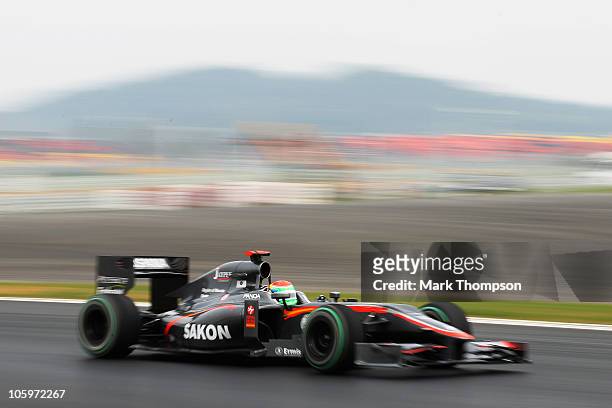 Sakon Yamamoto of Japan and Hispania Racing Team drives during qualifying for the Korean Formula One Grand Prix at the Korea International Circuit on...