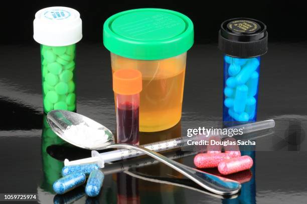 assortment of drug and testing paraphernalia - urine sample stock pictures, royalty-free photos & images