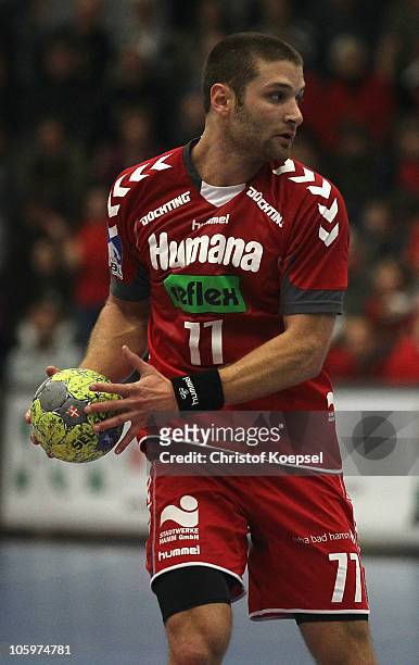 Chen Pomeranz of Ahlen-Hamm passes the ball during the Toyota Handball Bundesliga match between HSG Ahlen-Hamm and THW Kiel at the Maxipark Arena on...