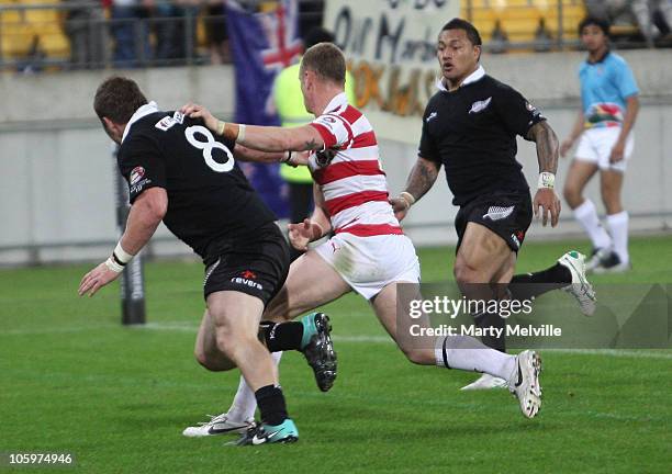 Kevin Brown of England pushes Greg Eastwood of the Kiwis out of the way before scoring a disallowed try, during the Four Nations match between the...