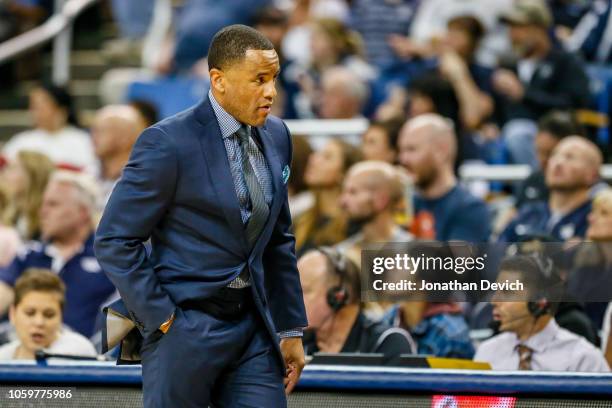 Head coach Damon Stoudamire of the Pacific Tigers walks down court near the end of the second half of the game between the Nevada Wolf Pack and the...