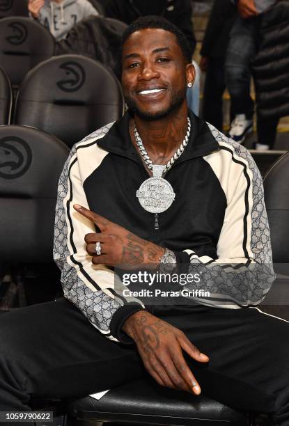 Rapper Gucci Mane attends The Detroit Pistons vs Atlanta Hawks Game at State Farm Arena on November 9, 2018 in Atlanta, Georgia.