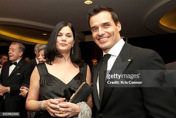 Linda Fiorentino and Antonio Sabato Jr pose for a photo during a reception before The National Italian American Foundation's 35th Anniversary Awards...