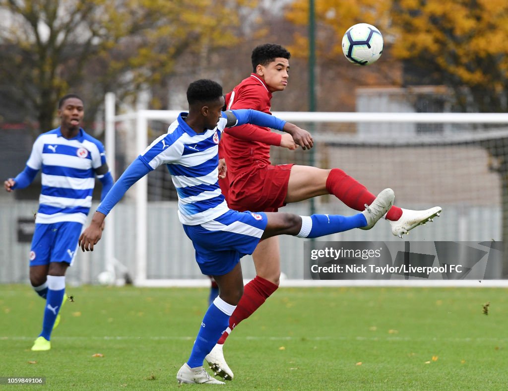 Kijana Hoever of Liverpool and Imari Samuels of Reading in action Kijana Hoever of Liverpool and Imari Samuels of Reading in action