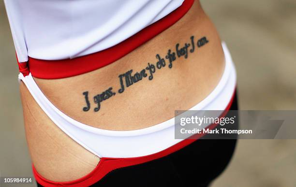 Tattoo on the back of a grid girl is seen before the Korean Formula One Grand Prix at the Korea International Circuit on October 24, 2010 in...