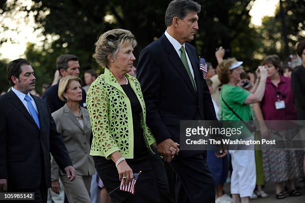 West Virginia Governor Joe Manchin and his wife Gayle in the procession as the coffin of Senator Robert Byrd arrives at the State Capitol in...
