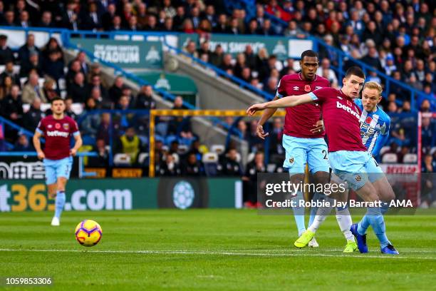 Alex Pritchard of Huddersfield Town scores a goal to make it 1-0 during the Premier League match between Huddersfield Town and West Ham United at...