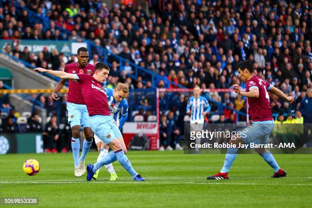 Alex Pritchard of Huddersfield Town scores a goal to make it 1-0 during the Premier League match between Huddersfield Town and West Ham United at...