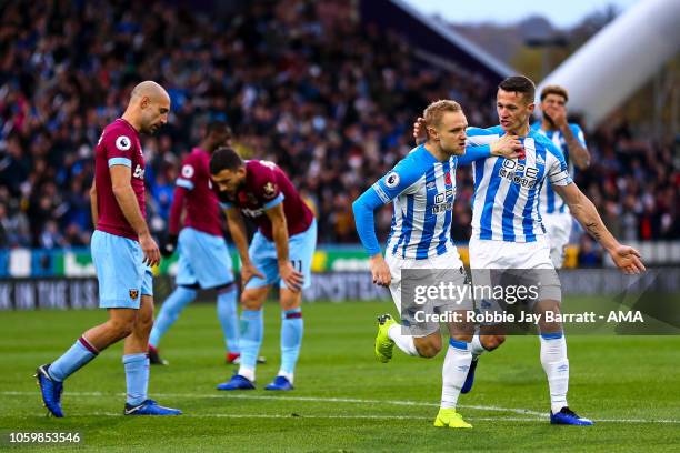 Alex Pritchard of Huddersfield Town celebrates after scoring a goal to make it 1-0 during the Premier League match between Huddersfield Town and West...