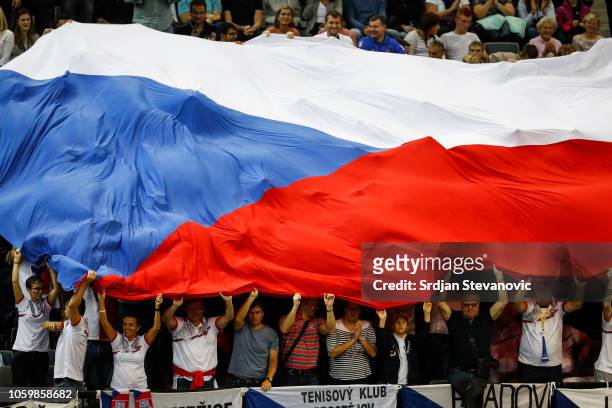 Czech fans wave their national flag as they cheer Barbora Strycova of Czech Republic during the Fed Cup Final between Czech Republic and USA at O2...