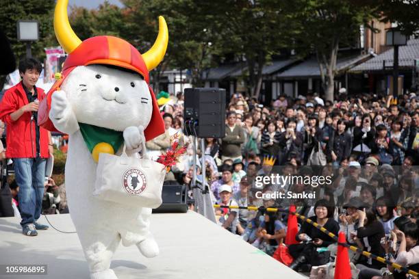 Hikonyan, the mascot of Hikone Castle 400th Anniversary, who sparked the Yuru Chara boom in Japan, is seen on stage during the "Yuru Chara Festival...