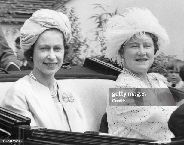 Britain's Queen Elizabeth II and Queen Mother Elizabeth arrive at Ascot racecourse on June 21, 1963.