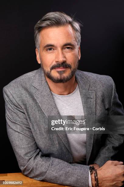 Presenter Olivier Minne poses during a portrait session in Paris, France on .