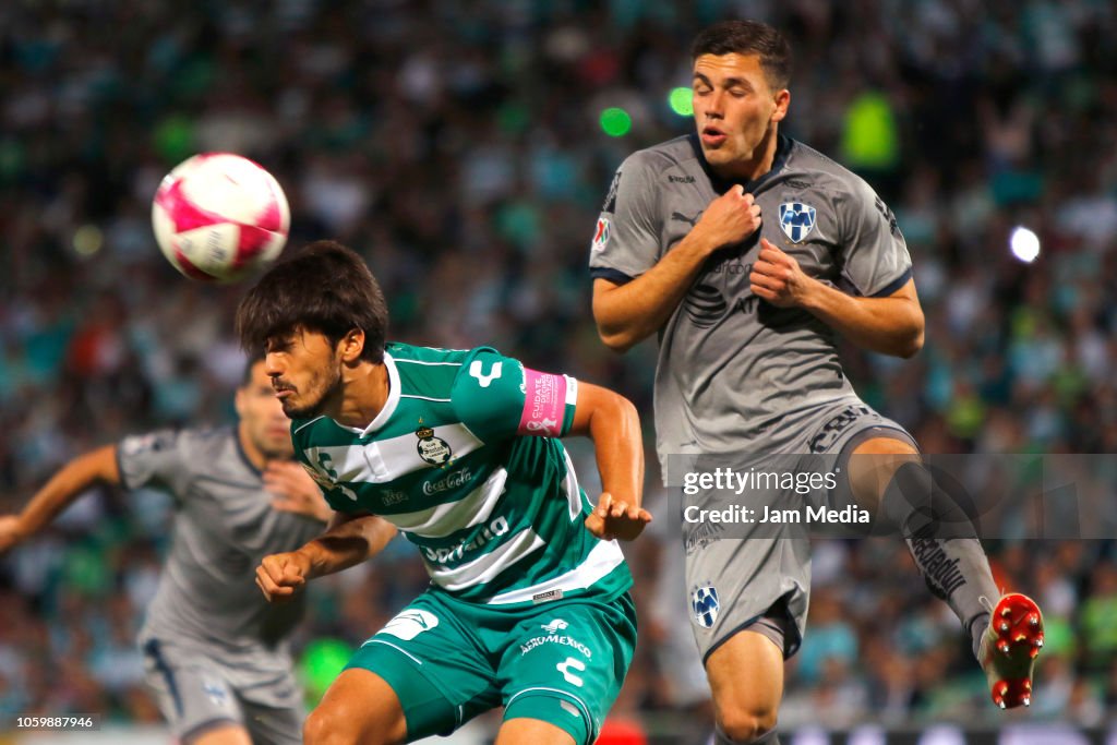 Jose Abella of Santos fights for the ball with Axel Grijalva of... News ...