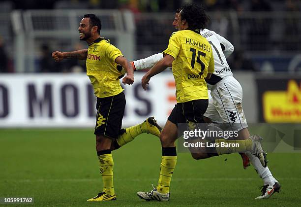 Antonio da Silva of Dortmund celebrates with team mates after scoring his teams first goal during the Bundesliga match between Borussia Dortmund and...