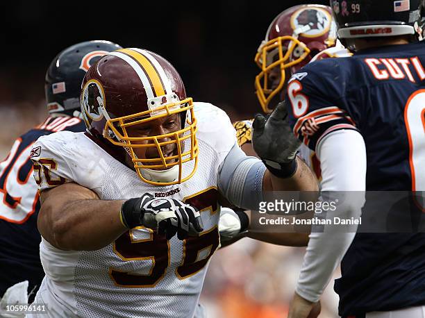 Ma'ake Kemoeatu of the Washington Redskins rushes towards Jay Cutler of the Chicago Bears at Soldier Field on October 24, 2010 in Chicago, Illinois....