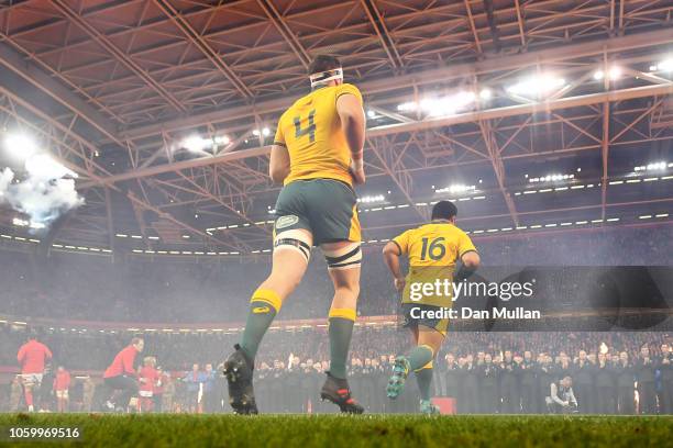 Izack Rodda and Tatafu Polota-Nau of Australia run onto the field prior to the International Friendly match between Wales and Australia at...