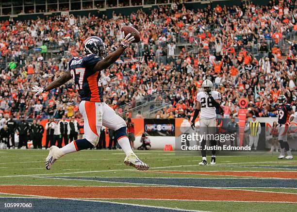 Running back Knowshon Moreno of the Denver Broncos celebrates his touchdown run in the second quarter against the Oakland Raiders at INVESCO Field at...