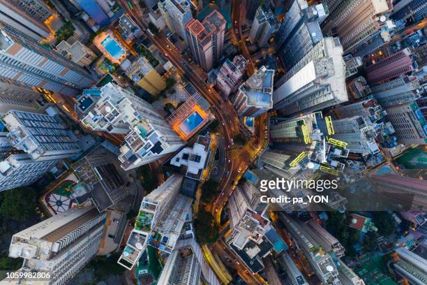 hong kong aerial scene in night, with road and traffic - overhead view stock-fotos und bilder